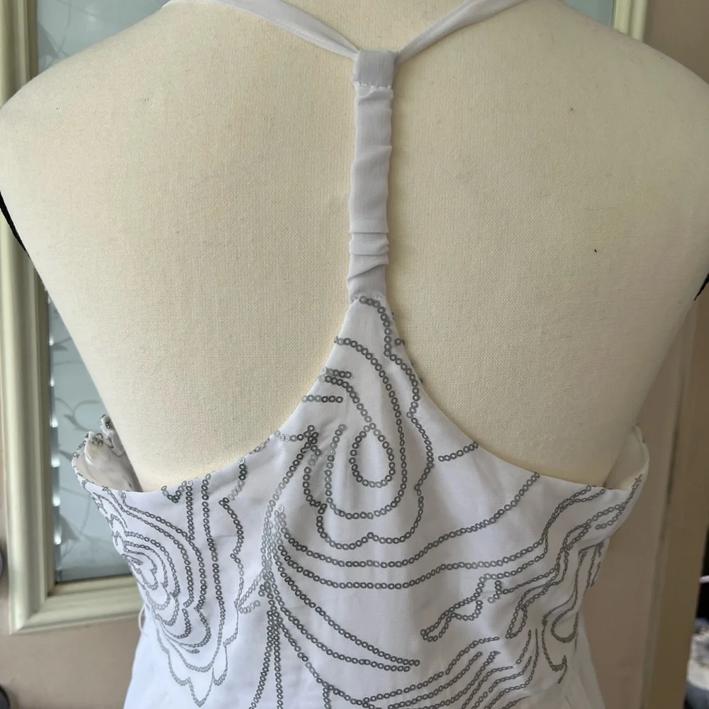 Johnny Martin size L white and silver floral Sequined dress. Racer back ruffled